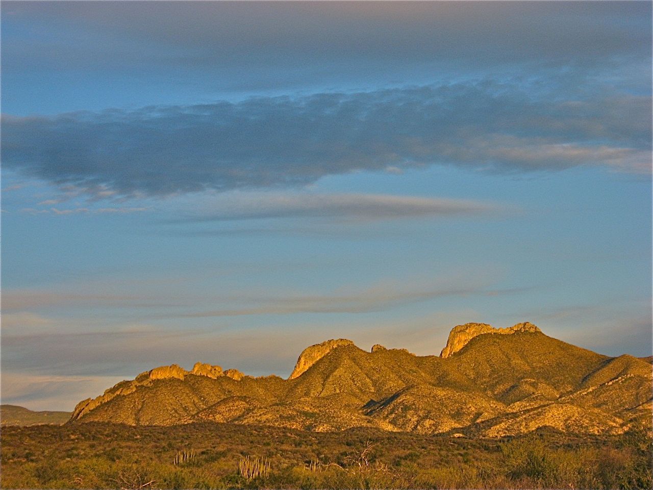 Sunset on the Devils's Spine, a rugged landmark in the Sonoran Sierras.